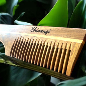 Sheesham wood comb with Shivangi engraving, showcasing natural craftsmanship and healthy hair benefits.